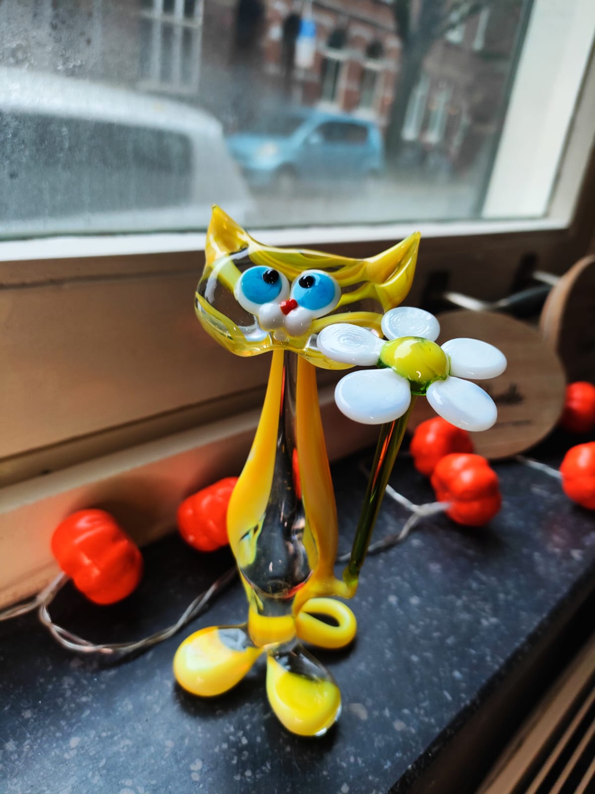 The Bloom Bearer – Cat with Flower Figurine